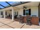 Wonderful backyard space features a brick patio, outdoor kitchen and ample space for entertaining at 4232 Spring Ln, Lakeland, FL 33811