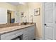 Bathroom vanity featuring granite countertops and modern fixtures at 4232 Spring Ln, Lakeland, FL 33811