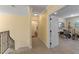 Hallway featuring carpet flooring, neutral paint, and an entrance to a recreation room at 4232 Spring Ln, Lakeland, FL 33811