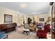 Inviting living room showcases classic decor, neutral carpet, and access to other areas at 4232 Spring Ln, Lakeland, FL 33811