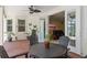 Relaxing outdoor patio with ceiling fan and outdoor seating featuring indoor access at 4232 Spring Ln, Lakeland, FL 33811
