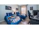 Charming bedroom with two twin beds, decorated with Star Wars themed decor and a cozy ambiance at 428 Orista Dr, Davenport, FL 33897