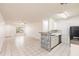 Spacious living room with tile flooring seamlessly flowing into the kitchen area at 4340 S Kirkman Rd # 901, Orlando, FL 32811