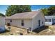 Back exterior view of home with sliding glass door at 50989 Highway 27 # 174, Davenport, FL 33897