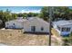 A shot of the backyard that has a sliding glass door and window at 50989 Highway 27 # 174, Davenport, FL 33897