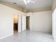 Spacious bedroom with tile flooring and ceiling fan at 50989 Highway 27 # 174, Davenport, FL 33897