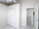 Cozy bedroom featuring tiled floors, closet, and an ensuite bathroom at 50989 Highway 27 # 174, Davenport, FL 33897
