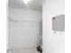 Walk in closet with wire shelving and water heater at 50989 Highway 27 # 174, Davenport, FL 33897