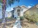 Inviting home with a well-kept lawn and a cozy front entrance at 50989 Highway 27 # 174, Davenport, FL 33897
