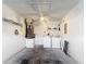 Garage with overhead lighting and laundry machines at 50989 Highway 27 # 174, Davenport, FL 33897