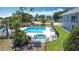 Aerial view of a community pool, spa, and sundeck at 50989 Highway 27 # 174, Davenport, FL 33897