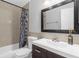 Bathroom featuring a tile shower/tub combination and modern vanity at 5809 Willow Bud Ct, Orlando, FL 32807