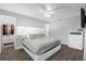 Spacious bedroom with gray walls, white trim, and walk-in closet at 5809 Willow Bud Ct, Orlando, FL 32807