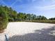 Sandy volleyball court offering a fun recreational activity for residents at 646 Longboat Dr, Davenport, FL 33896