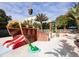 Community water park with pirate ship water slide and fun water features at 646 Longboat Dr, Davenport, FL 33896