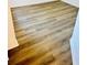 Close up of a new light brown wood look floor at 658 Caribbean Dr, Davenport, FL 33897