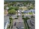 Aerial view of a home with a fenced backyard, well-maintained lawn, and other homes in a suburban neighborhood at 795 W Canton Ave, Winter Park, FL 32789