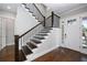 Beautiful entryway with hardwood floors, staircase, and lots of natural light at 795 W Canton Ave, Winter Park, FL 32789