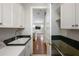 Laundry room with sink, shelving and full-size washer and dryer hookups at 795 W Canton Ave, Winter Park, FL 32789