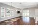Bright living room boasts hardwood floors, recessed lighting, and sliding glass doors at 795 W Canton Ave, Winter Park, FL 32789