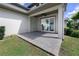 Covered patio features a brick-paved floor and a view of the backyard at 795 W Canton Ave, Winter Park, FL 32789