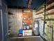 This is a storage area in the basement with a water heater and storage shelves at 804 Little Wekiwa Dr, Altamonte Springs, FL 32714