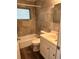 This is a full bathroom with a shower and tub, sink with vanity, and a toilet at 804 Little Wekiwa Dr, Altamonte Springs, FL 32714