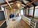 Large shed with wooden floor, overhead beams, shelves, and functional layout for storage at 804 Little Wekiwa Dr, Altamonte Springs, FL 32714