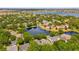 Expansive aerial view showcasing the neighborhood's serene water features and lush greenery at 8440 Woburn Ct, Windermere, FL 34786