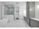 Luxurious bathroom with modern soaking tub and glass-enclosed shower at 8440 Woburn Ct, Windermere, FL 34786