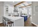 Bright open kitchen with stainless steel appliances and breakfast bar at 8440 Woburn Ct, Windermere, FL 34786