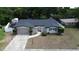 Charming single-story home featuring a well-maintained yard and welcoming facade at 8606 Lsu Ln, Orlando, FL 32817