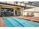 Beautiful swimming pool and outdoor patio with lounge chairs at 8814 Geneve Ct, Kissimmee, FL 34747