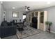 Cozy living room features modern decor, gray walls, and hardwood floors at 9313 Pavillion Dr, Orlando, FL 32825