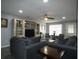 Comfortable living room boasts modern decor and an abundance of natural light at 9313 Pavillion Dr, Orlando, FL 32825