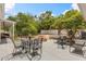 Outdoor patio featuring a seating area and mature landscaping at 932 Campbell Ave, Lake Wales, FL 33853