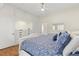 Bedroom with closet, hardwood floors, and ceiling fan at 932 Campbell Ave, Lake Wales, FL 33853