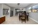Dining area showcases tile flooring with an open view to the kitchen and living spaces at 941 Barbados Ave, Orlando, FL 32825
