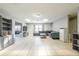 Large living room featuring tile floors, recessed lighting, and a gray sectional sofa at 941 Barbados Ave, Orlando, FL 32825