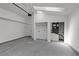 Spacious garage featuring door to outside, utility hookups and skylight providing natural light at 996 Big Oaks Dr, Oviedo, FL 32765