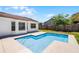 Inviting backyard pool with concrete patio, privacy fence and adjacent to home at 996 Big Oaks Dr, Oviedo, FL 32765