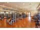 Well-equipped fitness center with modern exercise machines and motivational quote on the wall at 16825 Bolsena Dr, Montverde, FL 34756