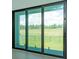 Large sliding glass patio door providing seamless indoor/outdoor living and views of the backyard at 16825 Bolsena Dr, Montverde, FL 34756