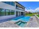 Backyard oasis with a pool, spa, and patio area at 16825 Bolsena Dr, Montverde, FL 34756