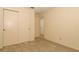 This bedroom features carpeted floors and a closet at 406 Red Coat Ln, Orlando, FL 32825