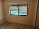Bedroom view to the backyard pool and lanai at 406 Red Coat Ln, Orlando, FL 32825