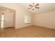 Bright living room featuring wood floors, a ceiling fan, and a window for natural light at 406 Red Coat Ln, Orlando, FL 32825