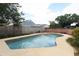 Private backyard pool offers respite from the Florida heat at 406 Red Coat Ln, Orlando, FL 32825