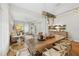 Elegant dining room featuring hardwood floors, a large table, and an open concept design at 8778 Peachtree Park Ct, Windermere, FL 34786