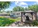 Backyard oasis with hot tub, patio, and shaded gazebo, perfect for outdoor relaxation and entertaining at 919 Boardman St, Orlando, FL 32804